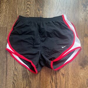 Nike Women's Black Athletic Shorts with Red Trim and White Side Panels